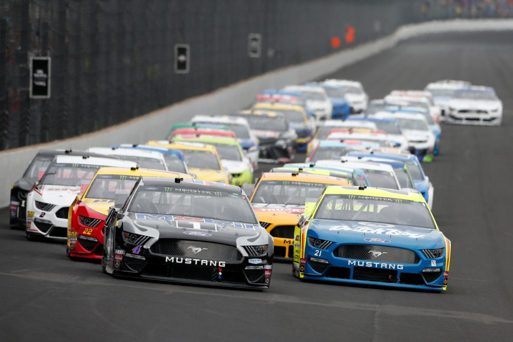 Kevin Harvick leads the field into Turn 1 during the Brickyard 400